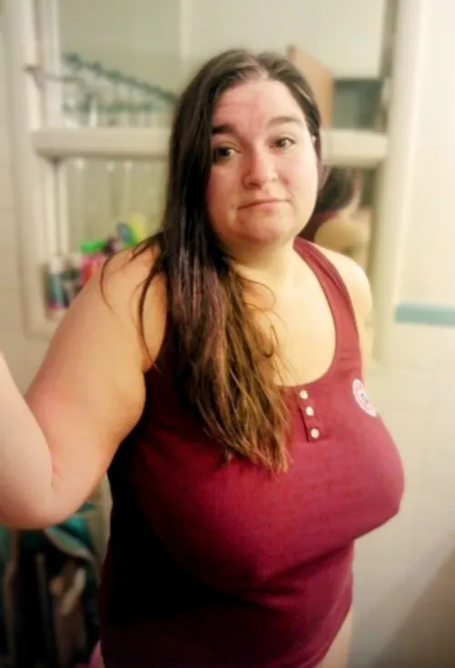 Thumbnail Embracing Braless Fashion: SteelTorch's Dark Red Tank Look