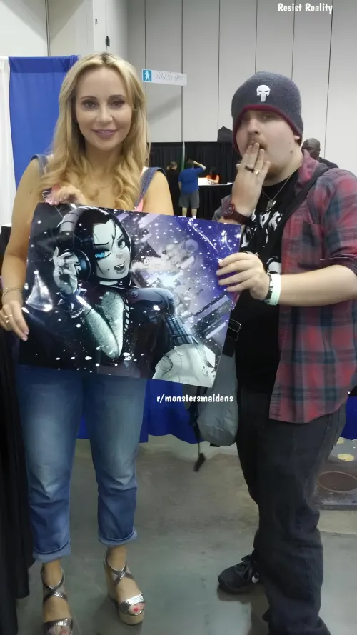 Thumbnail The Ultimate Boner for Raven Fans: Voice Actor Poses with Shadman's Raven - Revealed by SyntheticWaifu