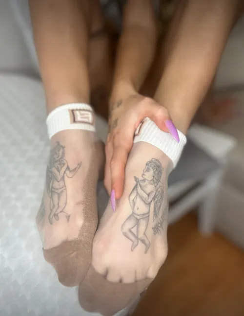 Thumbnail stella__morri's Devil Tattoos Peek Through Favorite Socks