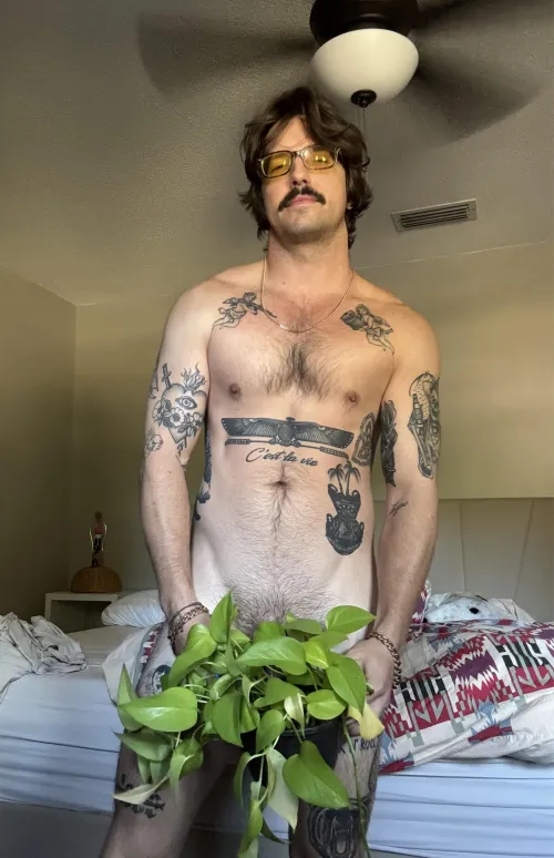 Thumbnail Join Automatic_Cowboy watering Pothos | Hotguyswithtattoos