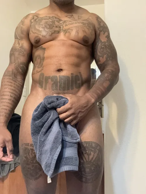 Thumbnail Towel Dilemma: Raygrayg123's Tattooed Contemplation