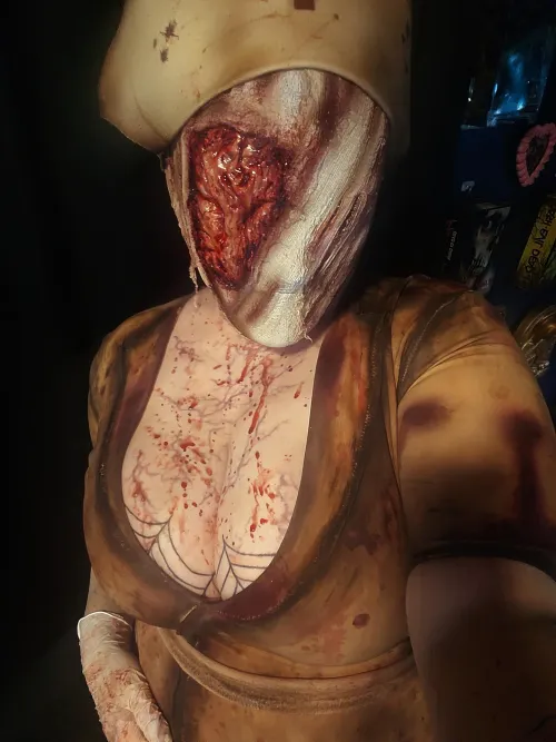 Thumbnail Cosplay Chronicles: Wicked_Webs Transforms into a Silent Hill Nurse | MonsterGirl