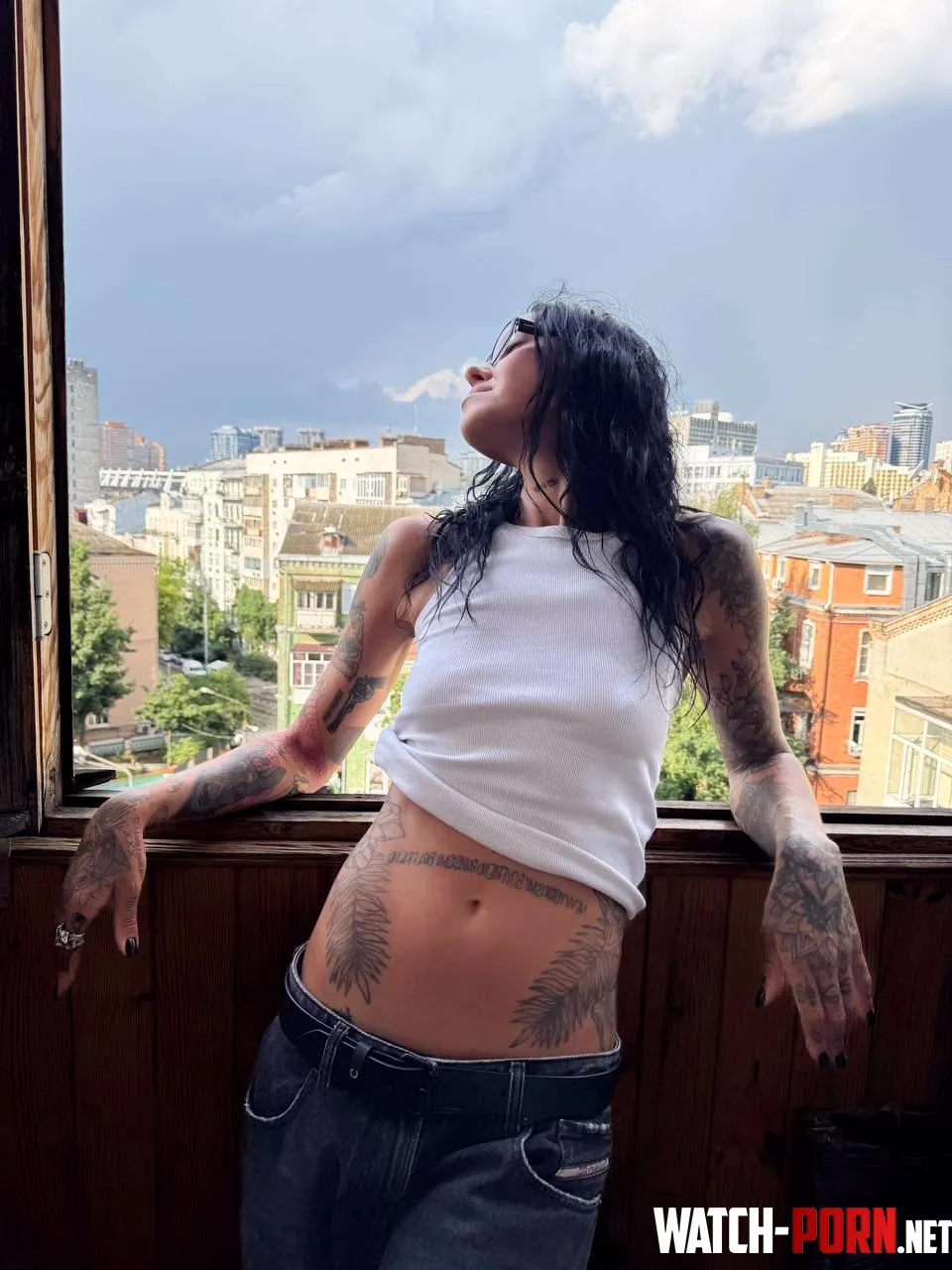 looking kinda cool in this pic with that pose view and tats on my midriff by helengem