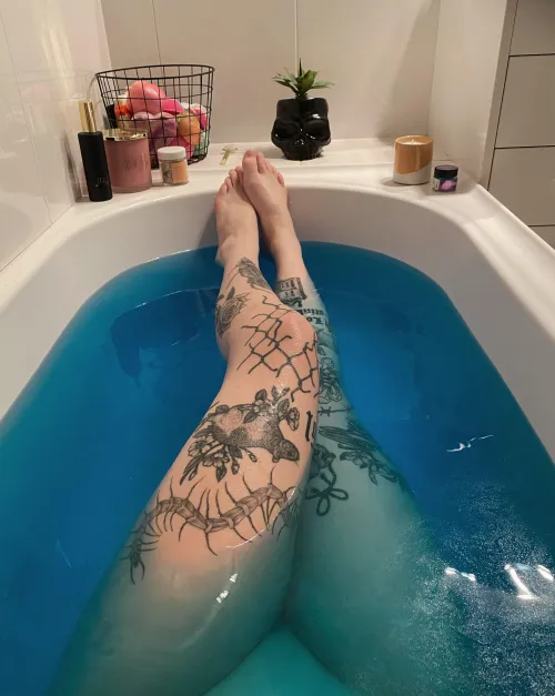 Thumbnail Relaxation and Rejuvenation: Legs Resting in the Tub by tiddy_mania