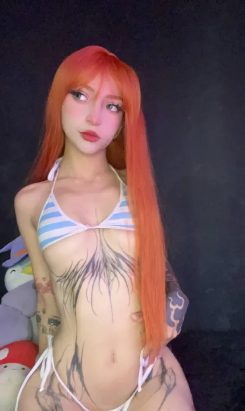 Thumbnail Character Spotlight: xLunaZK's cosplaygirls Article Features Nami from One Piece