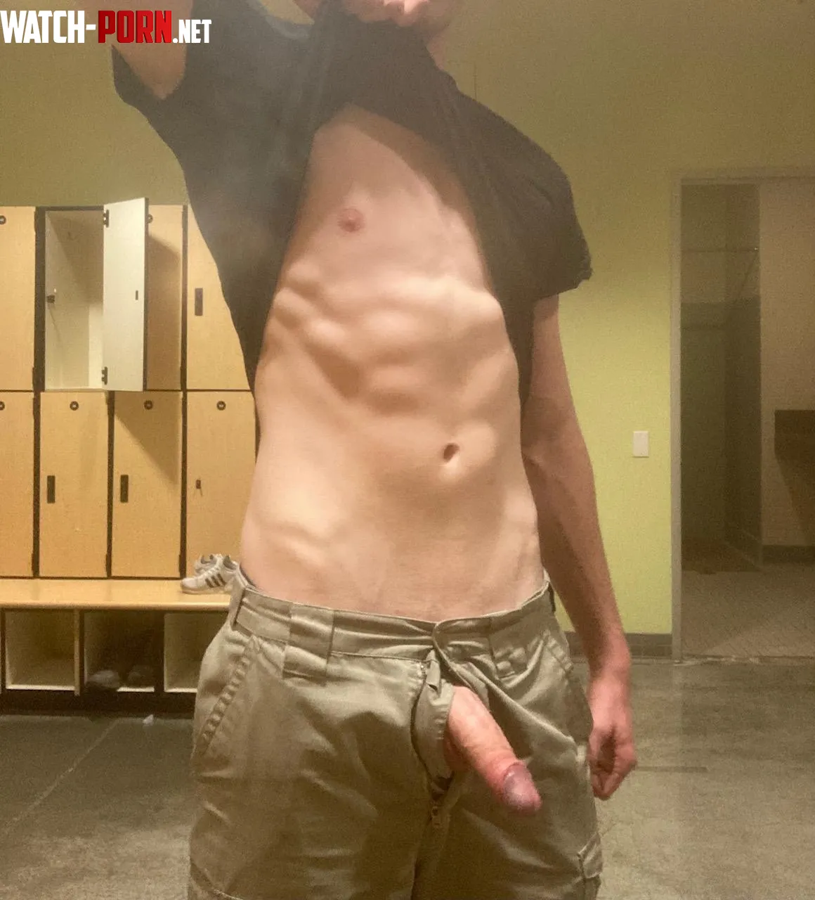 Showing off my abs and my soft cock in a public college locker room by Willing-Display8127