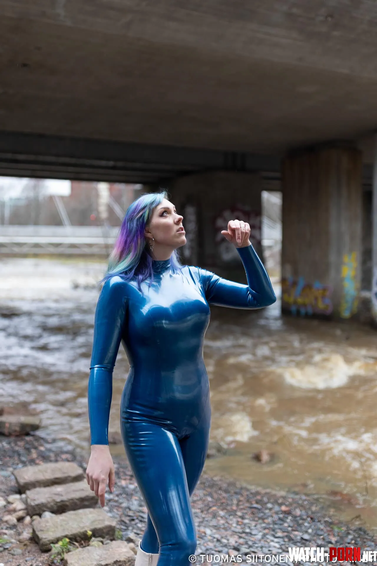 Wearing a catsuit underneath a bridge an old Finnish tradition old as this photo by TuomasS