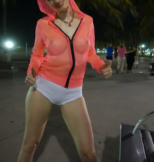 Thumbnail Exploring Ocean Drive in Miami Beach in a Fishnet Top | miaexhib