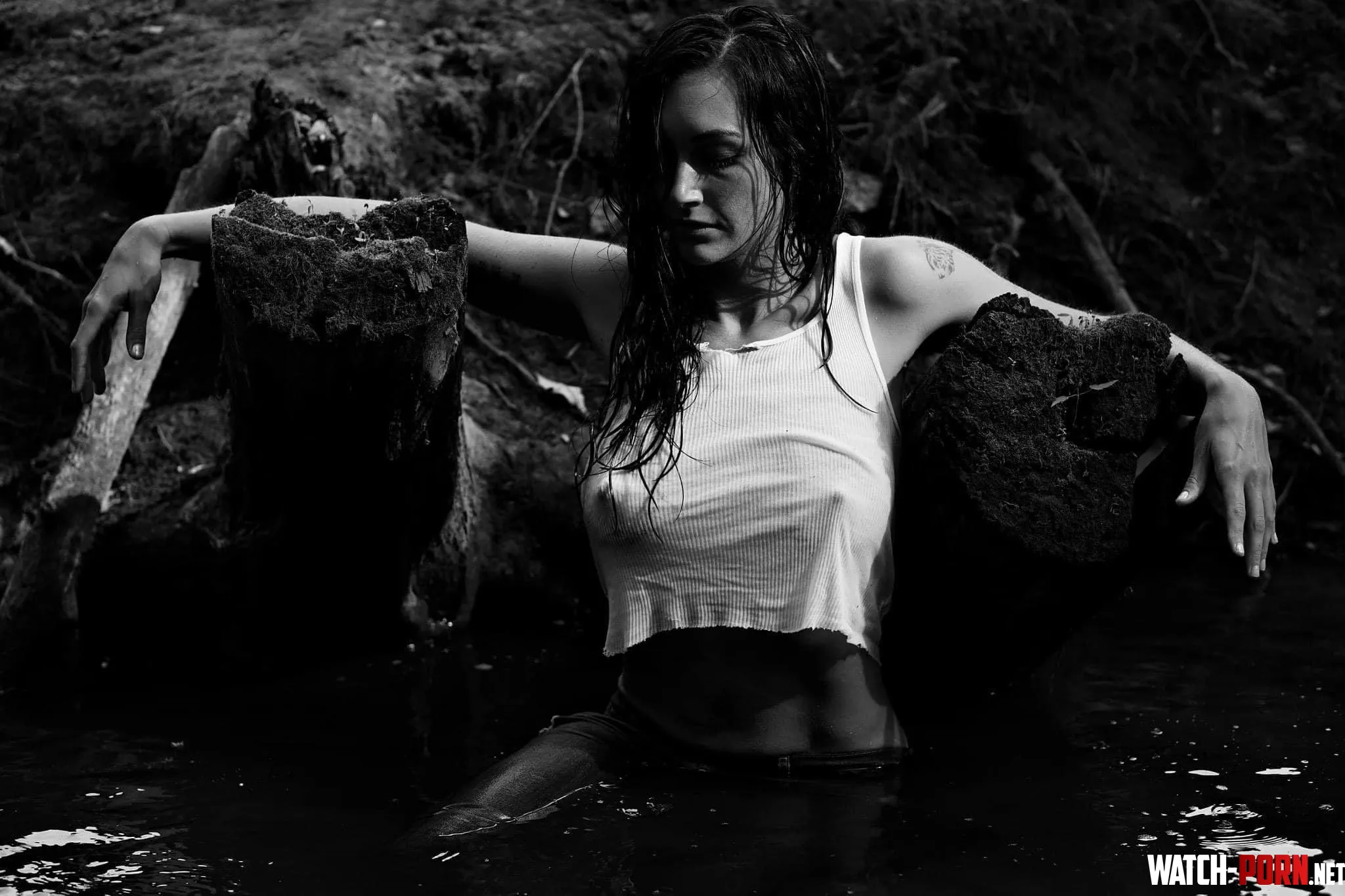 White tank and a river  by Brit_Bratt