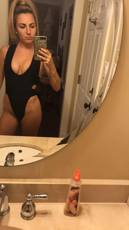 Thumbnail Seductive Suit: Top-Giver's Playful Question | OnePieceSuits