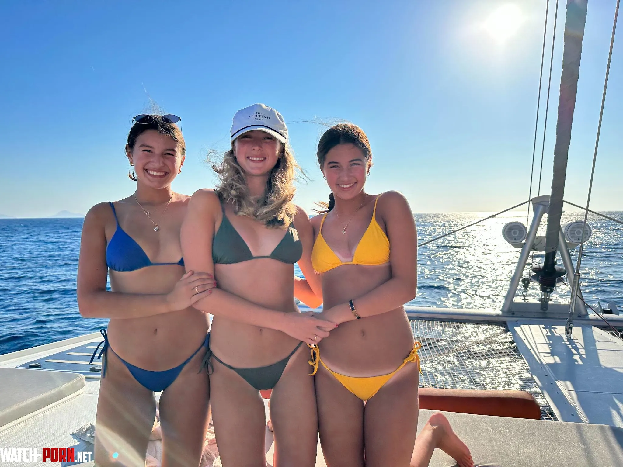 3 girls in blue green and yellow bikinis by sirshipwreck