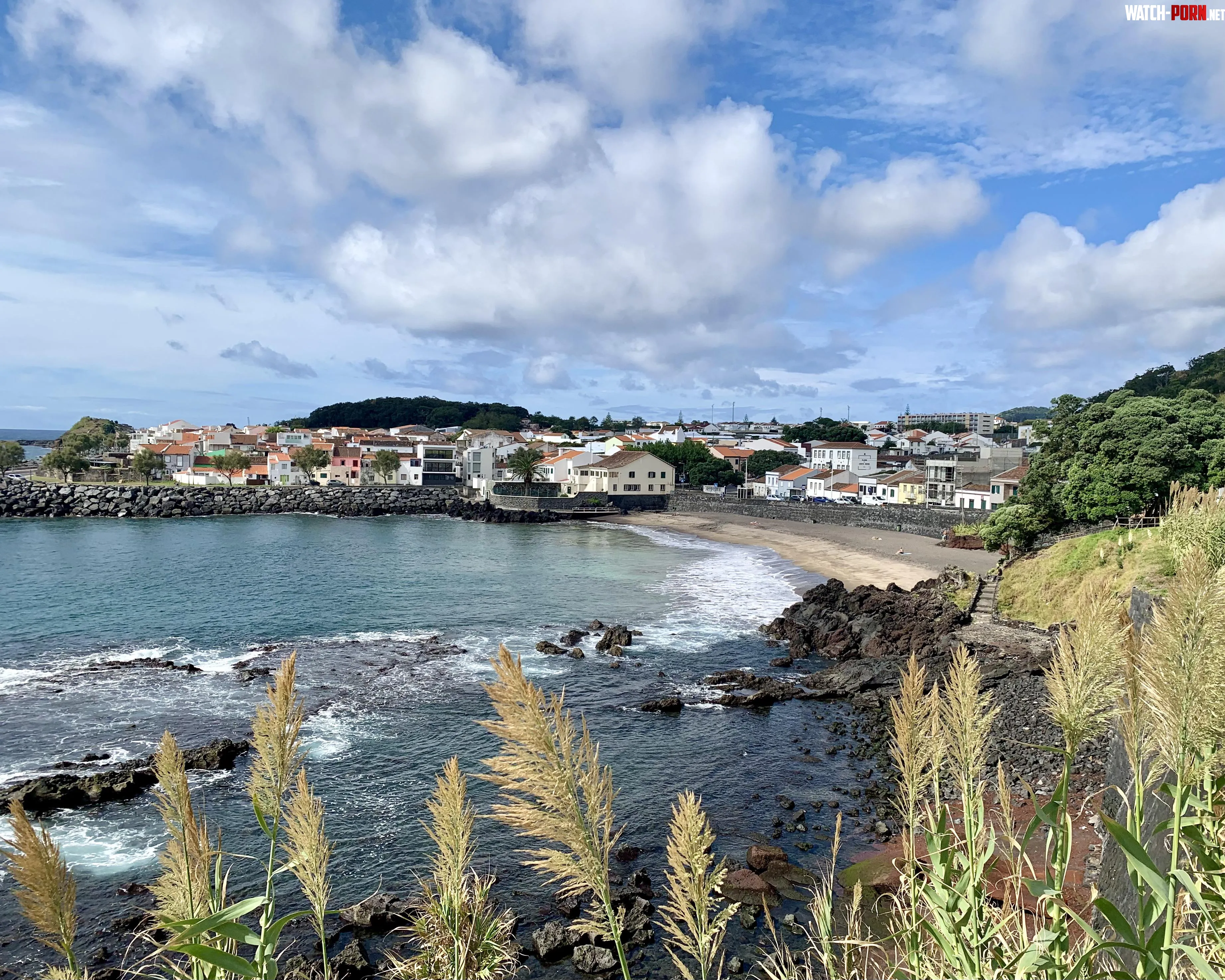 A tiny sandy beach enlarge and you will see bathers Praia de So Roque  on So Miguel Azores by PetroniusKing