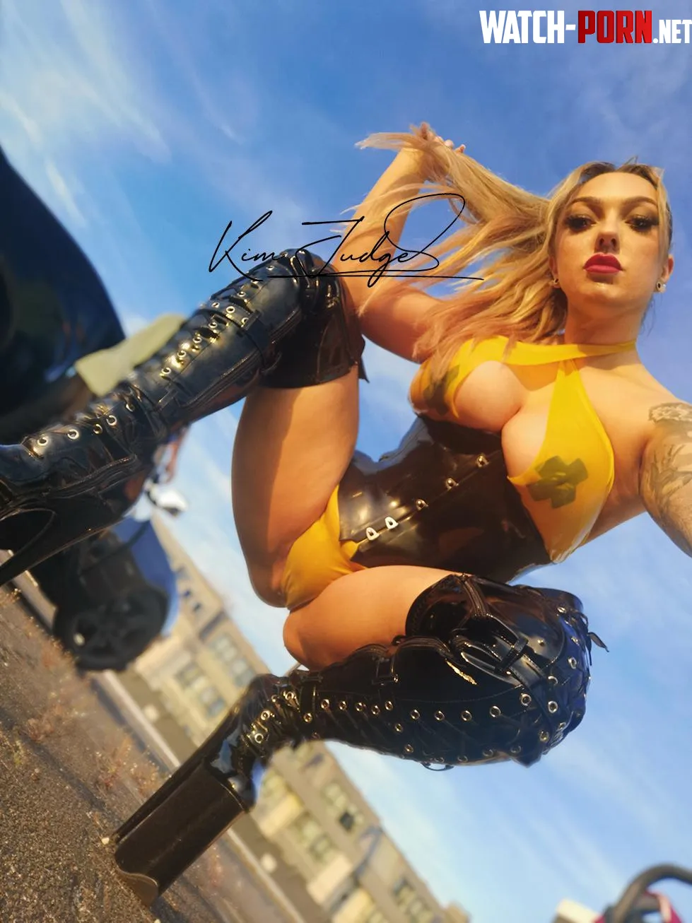 black and yellow latexand sky high boots by Kim_Judge