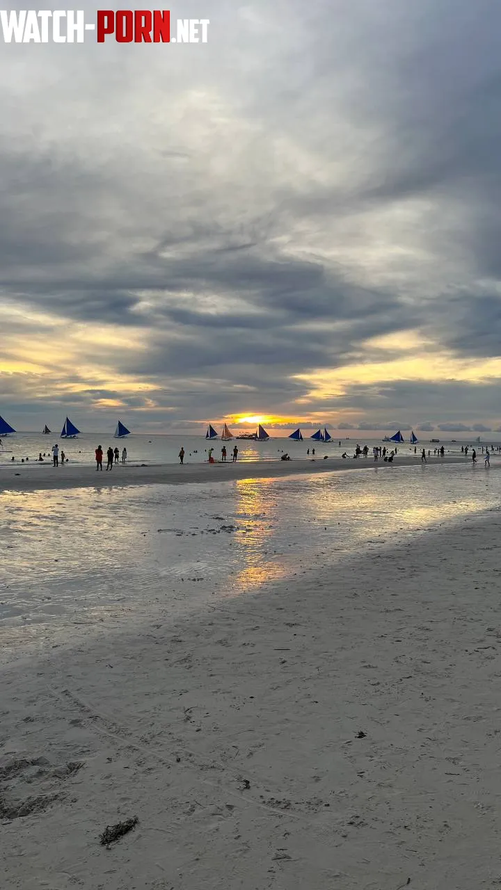 a cloudy sunset in boracay island philippines by Itchy-Yard-7800