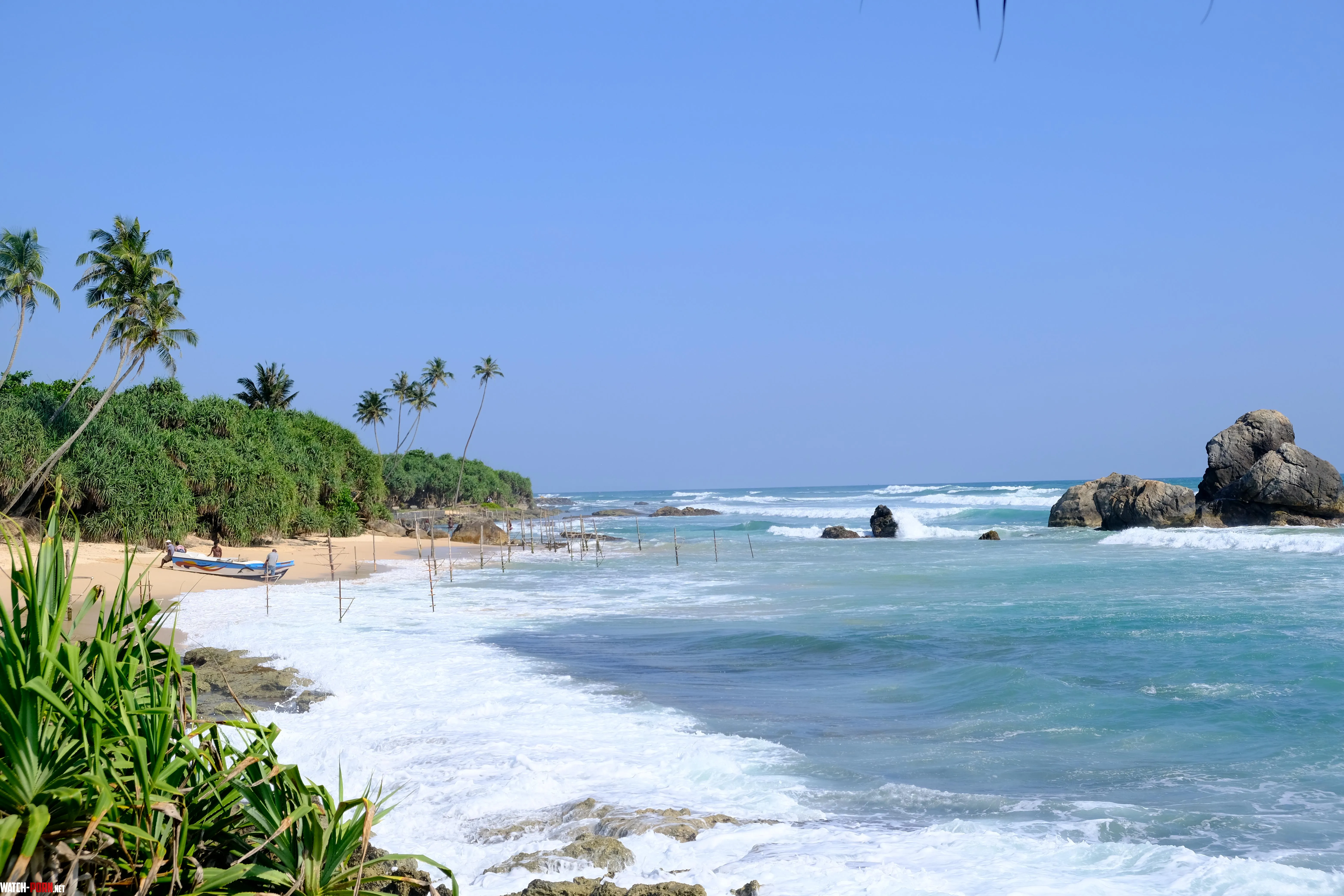 Midigama Beach Sri Lanka  the Sticks on the beach are for the Stilt Fishermen  a traditional way of fishing while sitting on these sticks by meshaun_journeys