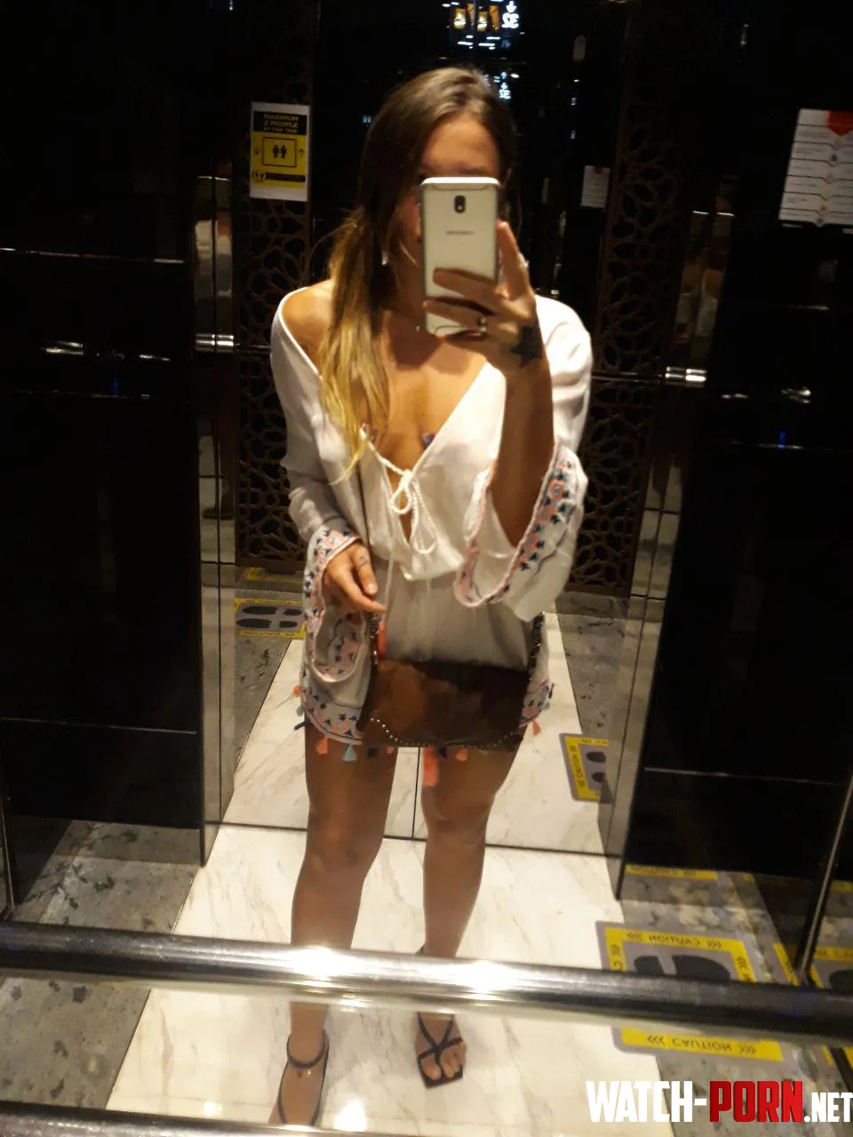 An elevator selfie for a Coachella night by beautyxellaa